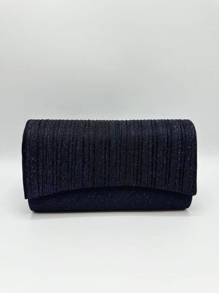 Den clutch - Dresses Boutique B.V.