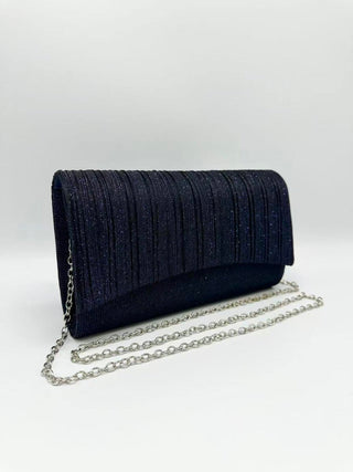 Den clutch - Dresses Boutique B.V.